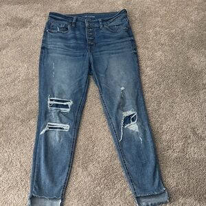 Women's Distressed Blue Jeans